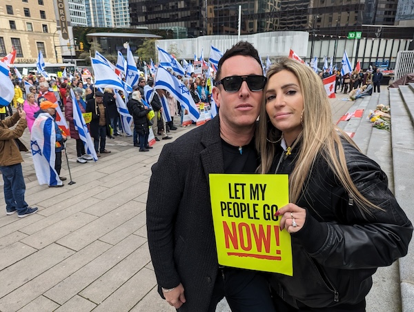 photo - Shai DeLuca and Alexandra Smith flew in Sunday from Toronto to address Vancouver’s weekly vigil for Israeli hostages on the six-month anniversary of the atrocities committed on Oct. 7