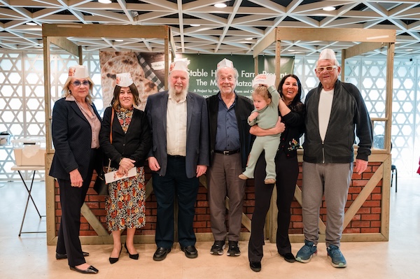 photo - Left to right: Joanne Belzberg, Henia Wineberg, Rabbi Yitzchok Wineberg, Arnold Silber, Tammi Kerzner and Syd Belzberg