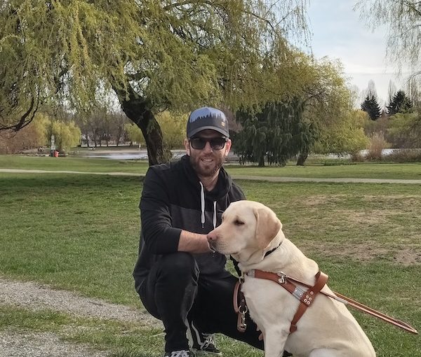 photo - Achiya Klein and Joy at Trout Lake Park in Vancouver April 4. Klein and Joy were brought together by the Israel Guide Dog Centre for the Blind