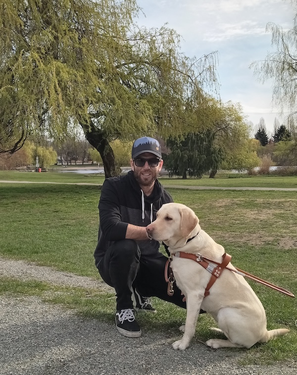 photo - Achiya Klein and Joy at Trout Lake Park in Vancouver April 4. Klein and Joy were brought together by the Israel Guide Dog Centre for the Blind