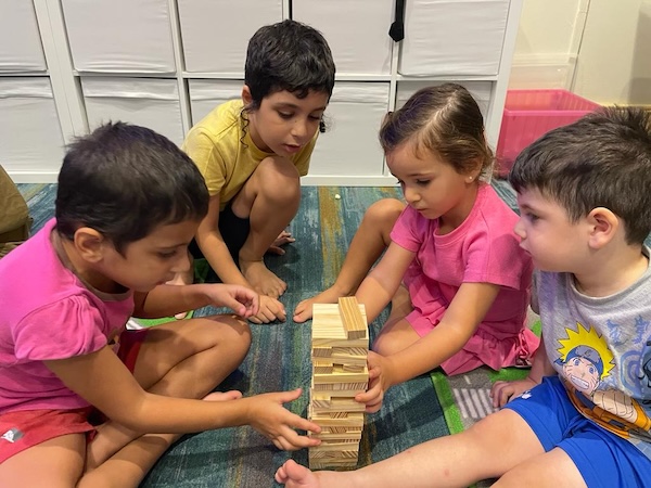 photo - kids playing Jenga
