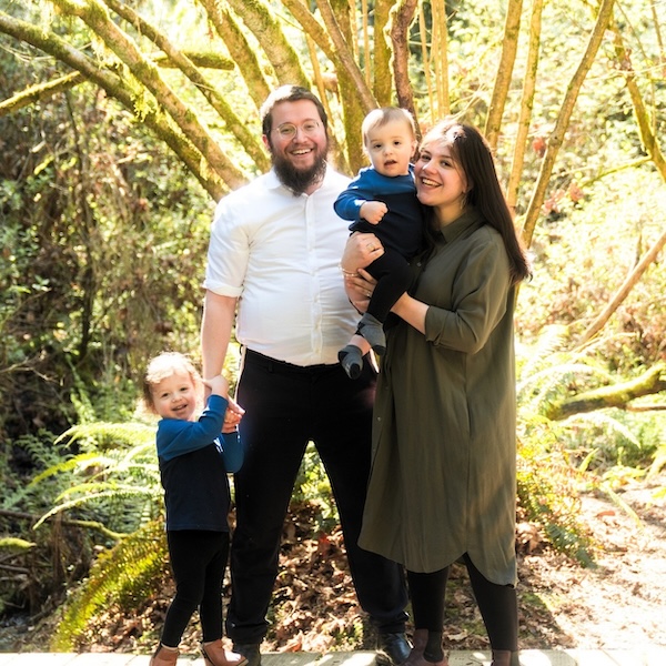 photo - Co-directors of Chabad of the Tri-Cities Rabbi Mottel and Nechama Gurevitz with their children
