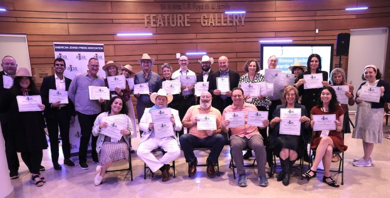photo - Israeli writer Gil Zohar (standing, seventh from the left) with other 2024 Rockower Award winners in Nashville, Tenn., last month