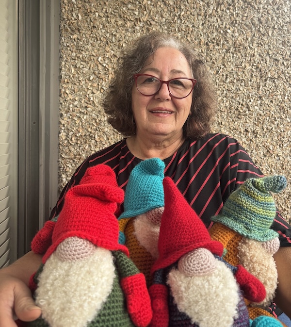 photo - Lea Bilot with some of her bearded gnomes