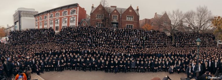 photo - Thousands of rabbis pose for a group photo in front of Chabad-Lubavitch world headquarters in Brooklyn, NY, on Dec. 1