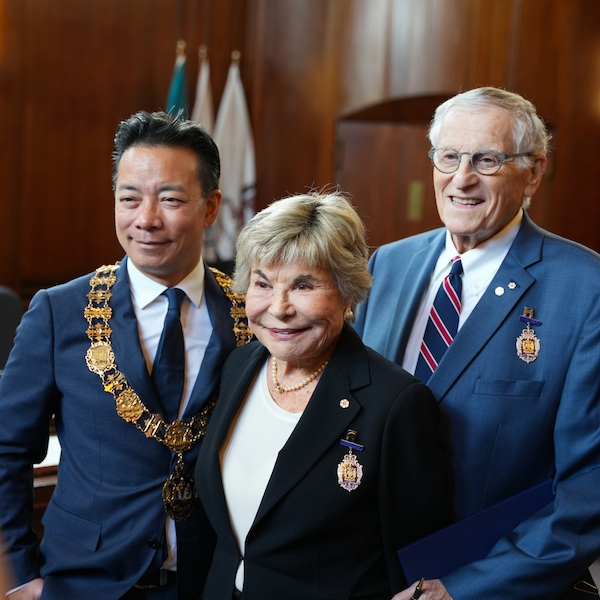 photo - Vancouver Mayor Ken Sim, left, with Leslie and Gordon Diamond