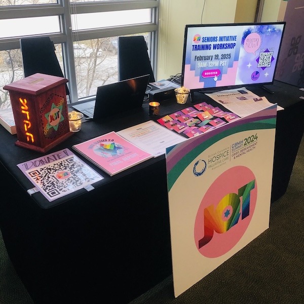 photo - JQT Vancouver’s table at the BC Hospice Palliative Care Association’s Grief, Bereavement and Mental Health Summit 2024, which took place Nov. 20-22