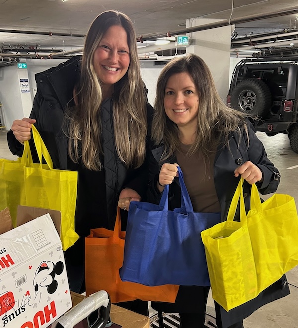 photo - Rose’s Angels co-founder Courtney Cohen, left, with May Stefanov, tenant relations coordinator with Tikva Housing Society