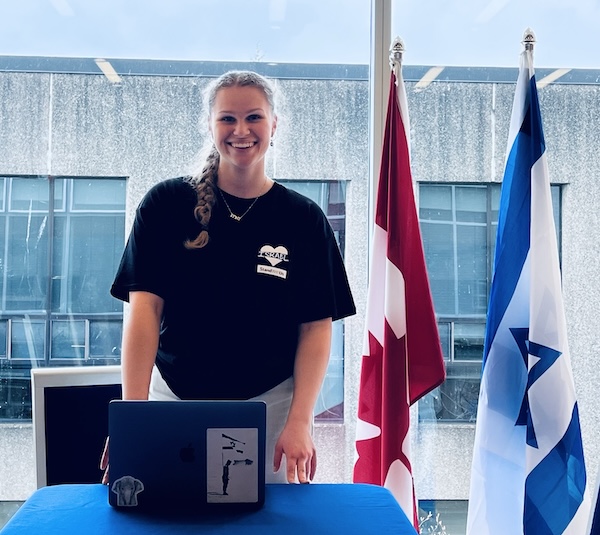 photo - Zara Nybo leads an Israel on Campus meeting at the University of British Columbia. Nybo is the new BC representative for StandWithUs Canada
