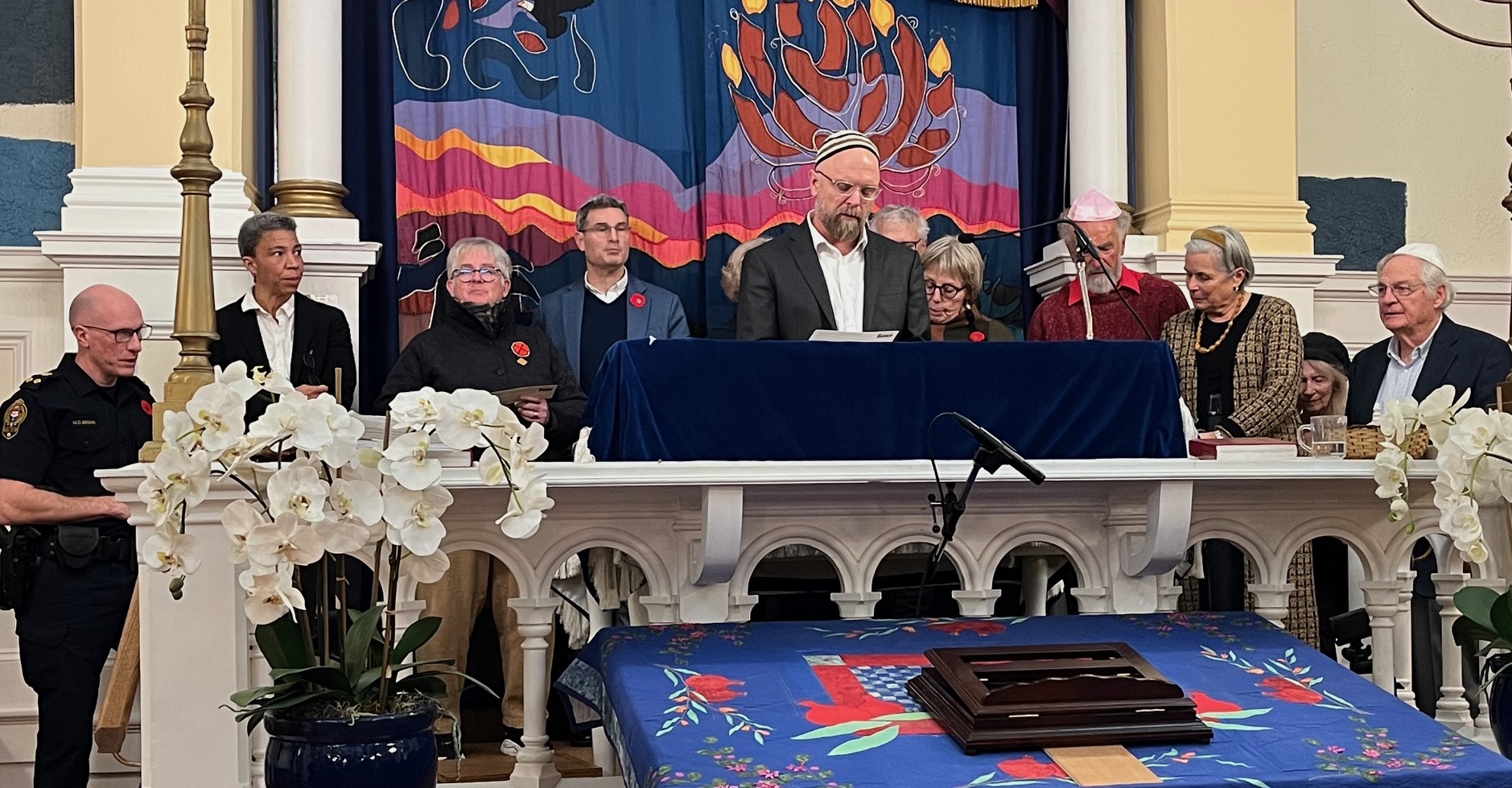 photo - At the Kristallnacht commemoration in Victoria on Nov. 6, Congregation Emanu-El’s Rabbi Elisha Herb led a community pledge of mutual respect and support, joined by local politicians, faith leaders and law enforcement