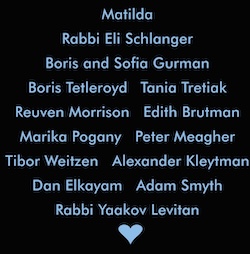 image - The back of the glow-in-the-dark menorah shirt lists the names of those murdered at Bondi Beach, Australia, on Dec. 14, while celebrating the first night of Hanukkah