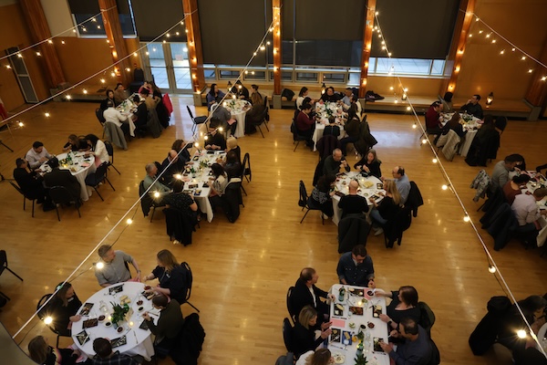photo - King David High School’s gymnasium was transformed into an Italian restaurant for this year’s Lion’s Den. Grade 10 students were responsible for every aspect of the meal, including the menu