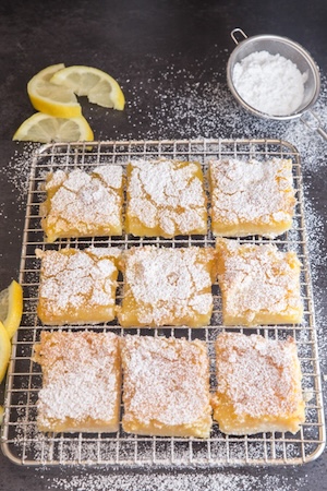 photo - Rosemary Molloy’s lemon squares are tart, melty, crumbly heaven in a pan. For more of Molloy’s recipes, visit anitalianinmykitchen.com