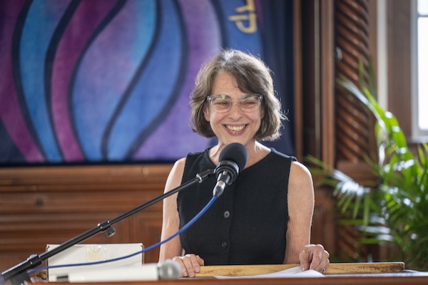 photo - Rabbi Hannah Dresner addresses those gathered on May 28 for Or Shalom’s Chanukat HaBayit, or homecoming