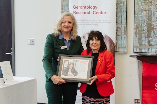 photo - Laurel Weldon, dean of Simon Fraser University’s faculty of arts and social sciences, and Dr. Gloria Gutman at the April 22 reception celebrating the naming of the university’s Gerontology Research Centre in honour of Gutman’s service and lasting impact. The event was held at SFU Harbour Centre