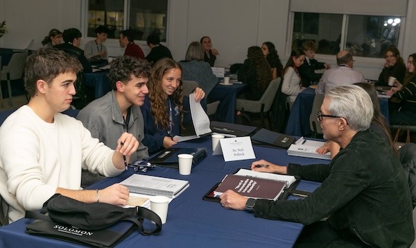 photo - Mentoring hour in action, as fellows connect with their mentors for conversations and guidance