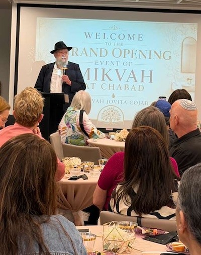 photo - Rabbi Yitzchok Wineberg speaks about seeing the 25-year-old dream of a new mikvah become reality