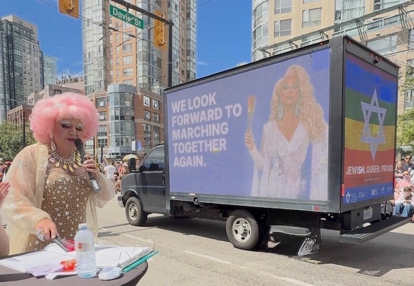 photo - The Jewish community’s Pride truck displayed rotating digital messages throughout the Aug. 2 parade