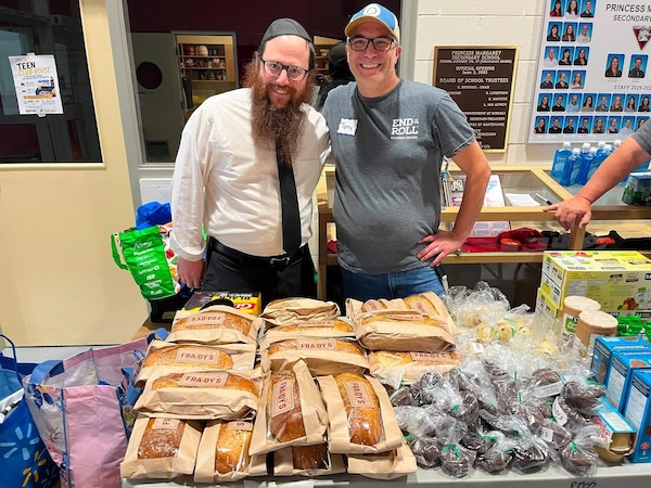photo - More than 100 loaves of homemade bread, chocolate muffins and chocolate chip cookies were delivered to the Comfort Centre for Bald Range Wildfire evacuees.