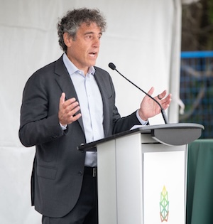 photo - David Porte, JWest Corp chair, addresses those gathered