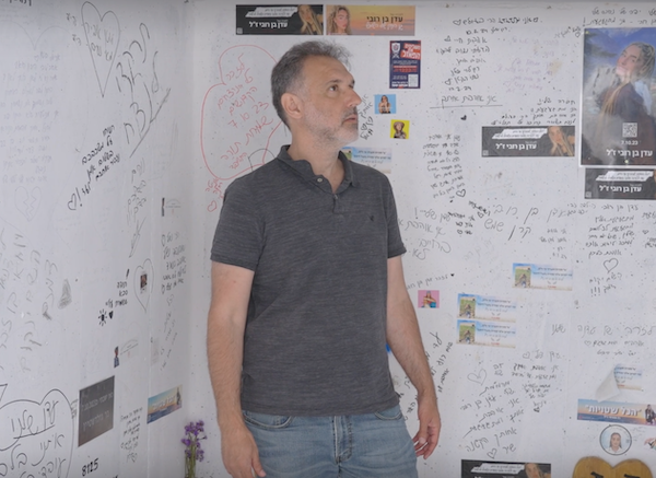 screenshot - Filmmaker Igal Hecht reflects inside one of the bomb shelters where Israelis fleeing rockets and terrorists were murdered on Oct. 7, 2023