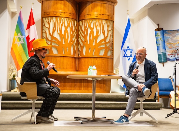 photo - Boy George spoke with Rabbi Dan Moskovitz, but performed at Temple Sholom on Sept. 9